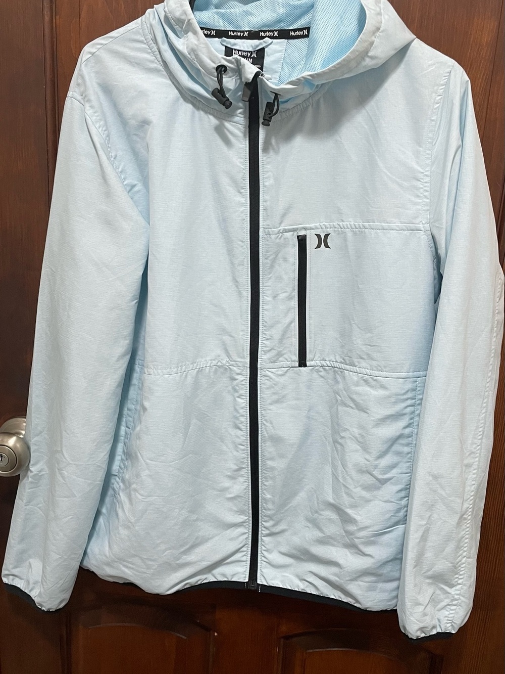 Hurley women’s . Performance ripstop windbreaker in sea Haze / light blue size M